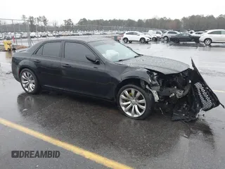 2015 Chrysler 300 300C with VIN 2C3CCAEG8FH786879, listed as a IAAI auction lot 41563321 with 130,060 mi miles. Bid and sale history available at carsss.com. Image 1.
