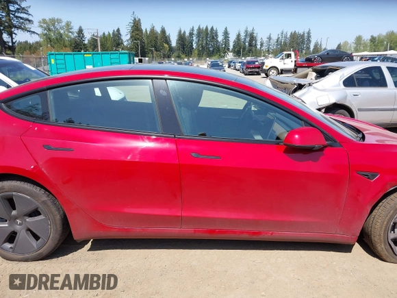 2023 Tesla Model 3 Long Range with VIN 5YJ3E1EBXPF603421, listed as a IAAI auction lot 42105037 with 13,186 mi miles and . Bid and sale history available at DreamBid. Image 13.