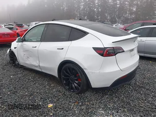 2023 Tesla Model Y Performance z VIN 7SAYGDEF2PF917295, wystawiony jako IAAI lot #41260852 z przebiegiem 23 295 mil mil oraz . Historia ofert i sprzedaży dostępna na DreamBid. Obrazek 3.