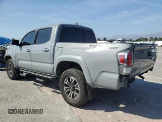 2020 Toyota Tacoma SR5 with VIN 3TMAZ5CN2LM137991, listed as a Copart auction lot 60317895 with 98,054 mi miles and Salvage title. Bid and sale history available at DreamBid. Image 2.