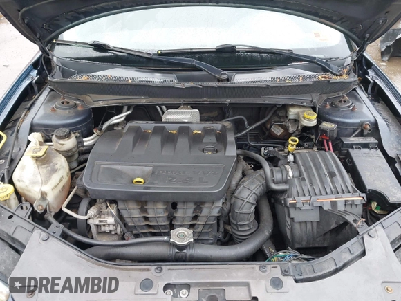2007 Chrysler Sebring Touring z VIN 1C3LC56K37N644894, wystawiony jako IAAI lot #42326982 z przebiegiem 206 073 mil mil oraz . Historia ofert i sprzedaży dostępna na DreamBid. Obrazek 10.