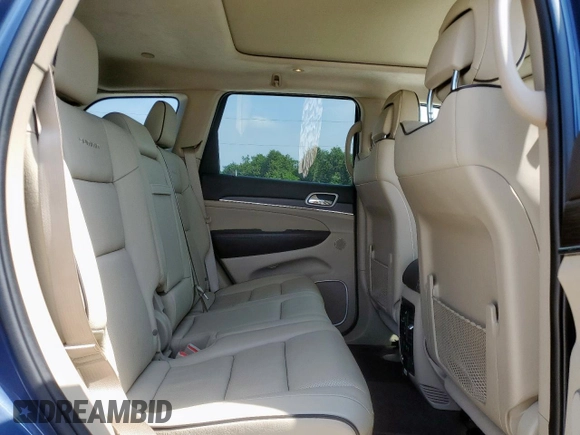 2021 Jeep Grand Cherokee Summit with VIN 1C4RJEJG2MC657402, listed as a Copart auction lot 59098465 with 61,442 mi miles and Salvage title. Bid and sale history available at DreamBid. Image 11.
