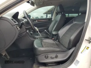 2014 Volkswagen Passat SEL Premium with VIN 1VWCN7A33EC109183, listed as a Copart auction lot 61369595 with 146,794 mi miles and Salvage title. Bid and sale history available at DreamBid. Image 7.
