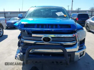 2016 Toyota Tundra SR z VIN 5TFRM5F13GX095535, wystawiony jako IAAI lot #41618316 z przebiegiem 131 386 mil mil oraz . Historia ofert i sprzedaży dostępna na DreamBid. Obrazek 13.