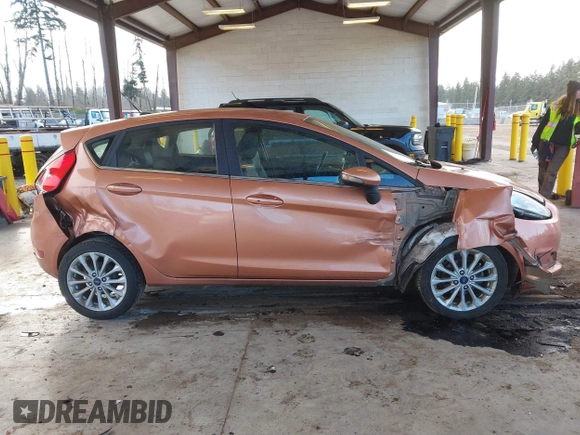 2017 Ford Fiesta Titanium with VIN 3FADP4FJ6HM139455, listed as a IAAI auction lot 41533050 with 104,788 mi miles and . Bid and sale history available at DreamBid. Image 13.
