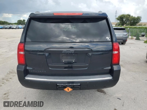 2015 Chevrolet Suburban LTZ with VIN 1GNSCKKCXFR613516, listed as a Copart auction lot 65519984 with 191,711 mi miles and Non Repairable. Bid and sale history available at DreamBid. Image 6.