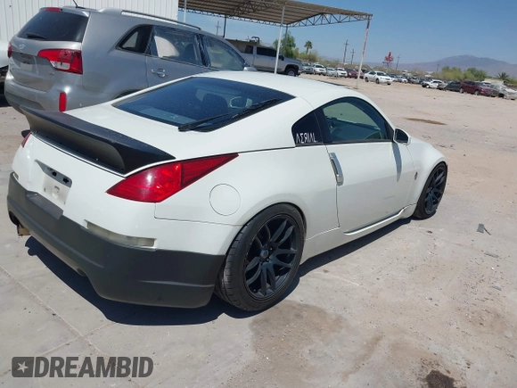 2004 Nissan 350Z Touring with VIN JN1AZ34E34T060024, listed as a IAAI auction lot 42327915 with 96,197 mi miles and . Bid and sale history available at DreamBid. Image 4.