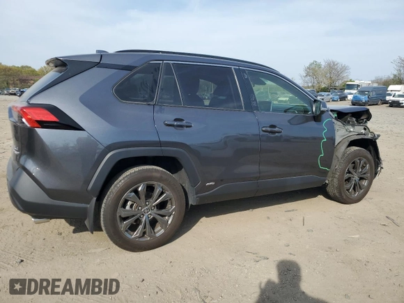 2023 Toyota RAV4 Hybrid XLE Premium z VIN JTMB6RFV4PD089184, wystawiony jako Copart lot #53453205 z przebiegiem 29 931 mil mil oraz Szkoda całkowita • Salvage title. Historia ofert i sprzedaży dostępna na DreamBid. Obrazek 3.