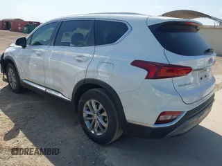 2019 Hyundai Santa Fe SE with VIN 5NMS23AD8KH051223, listed as a IAAI auction lot 42017754 with 146,704 mi miles and . Bid and sale history available at DreamBid. Image 3.