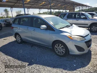 2013 Mazda 5 Sport z VIN JM1CW2BLXD0148001, wystawiony jako Copart lot #63296815 z przebiegiem 162 513 mil mil oraz Szkoda całkowita • Salvage title. Historia ofert i sprzedaży dostępna na DreamBid. Obrazek 4.