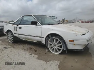 1986 Toyota MR2 z VIN JT2AW15C2G0049232, wystawiony jako Copart lot #47584895 z przebiegiem 185 369 mil mil oraz Tytuł czysty. Historia ofert i sprzedaży dostępna na DreamBid. Obrazek 4.