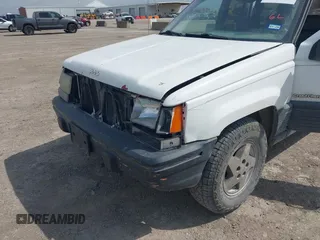 1994 Jeep Grand Cherokee Laredo with VIN 1J4FX58SXRC120936, listed as a IAAI auction lot 42530212 with 126,367 mi miles and . Bid and sale history available at DreamBid. Image 16.