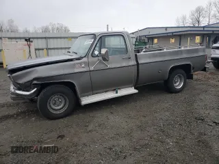 1977 GMC Sierra 1500 with VIN TCL4471504040, listed as a Copart auction lot 81852484 with Not Provided miles and Salvage Title. Bid and sale history available at DreamBid. Image 1.