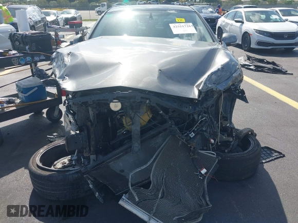 2014 Infiniti Q50 Premium with VIN JN1BV7AP0EM675221, listed as a IAAI auction lot 42551726 with 191,334 mi miles and . Bid and sale history available at DreamBid. Image 6.