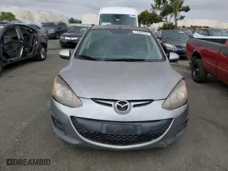 2012 Mazda Mazda2 Sport with VIN JM1DE1KZ2C0147560, listed as a Copart auction lot 71663534 with 168,798 mi miles and Salvage Title. Bid and sale history available at carsss.com. Image 5.
