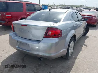 2014 Dodge Avenger SE with VIN 1C3CDZAB9EN143677, listed as a IAAI auction lot 42068802 with 142,134 mi miles and . Bid and sale history available at DreamBid. Image 4.