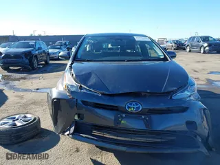 2020 Toyota Prius L Eco with VIN JTDKARFU5L3104460, listed as a IAAI auction lot 41298045 with 79,412 mi miles. Bid and sale history available at carsss.com. Image 6.