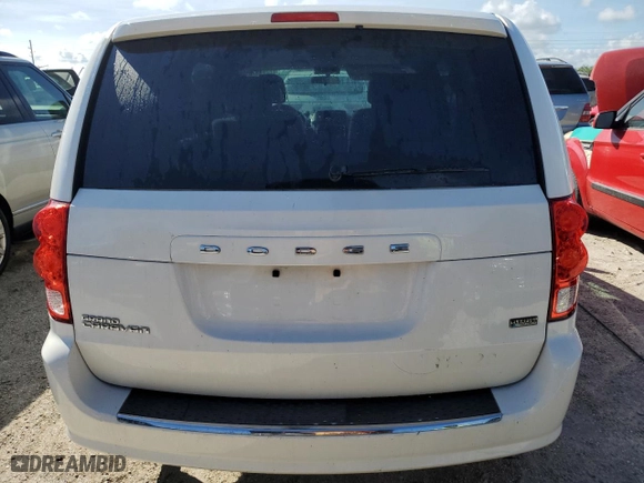 2012 Dodge Grand Caravan SXT with VIN 2C4RDGBG9CR405203, listed as a Copart auction lot 73689184 with 42,959 mi miles and Salvage Title. Bid and sale history available at carsss.com. Image 6.