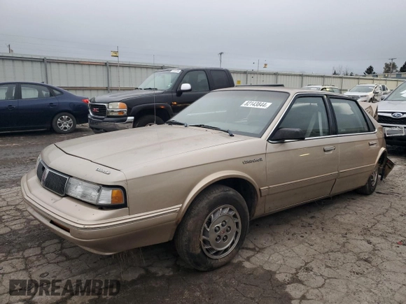 1995 Oldsmobile Cutlass Ciera SL z VIN 1G3AJ55MXS6369507, wystawiony jako Copart lot #82143844 z przebiegiem 95 303 mil mil oraz Szkoda całkowita • Salvage title. Historia ofert i sprzedaży dostępna na DreamBid. Obrazek 1.