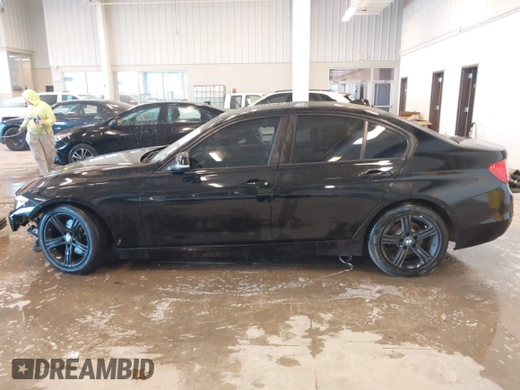 2015 BMW 3 Series 320i xDrive with VIN WBA3C3C56FK203031, listed as a IAAI auction lot 41012182 with 83,611 mi miles and . Bid and sale history available at DreamBid. Image 14.