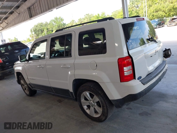 2014 Jeep Patriot High Altitude with VIN 1C4NJPFA1ED653402, listed as a IAAI auction lot 42371410 with 165,459 mi miles and . Bid and sale history available at DreamBid. Image 14.