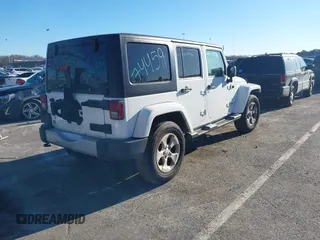 2013 Jeep Wrangler Unlimited Sahara with VIN 1C4BJWEG3DL658530, listed as a IAAI auction lot 41421006 with 115,321 mi miles and . Bid and sale history available at DreamBid. Image 4.