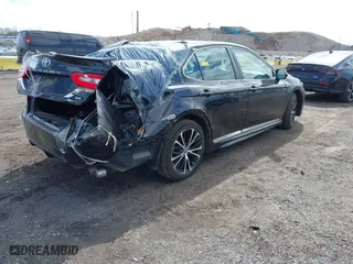 2018 Toyota Camry LE with VIN 4T1B11HK5JU076028, listed as a IAAI auction lot 41989266 with 215,235 mi miles. Bid and sale history available at carsss.com. Image 4.