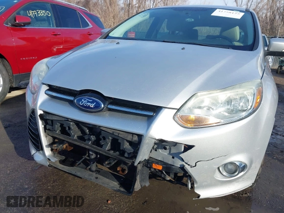 2012 Ford Focus SEL with VIN 1FAHP3M22CL413512, listed as a IAAI auction lot 41758125 with 161,857 mi miles. Bid and sale history available at carsss.com. Image 6.