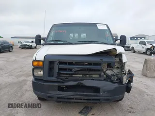 2013 Ford Econoline Cargo Commercial with VIN 1FTNE2EW9DDB02704, listed as a IAAI auction lot 42596289 with 243,629 mi miles and . Bid and sale history available at DreamBid. Image 11.