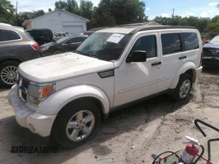2008 Dodge Nitro SXT with VIN 1D8GU28K38W270306, listed as a IAAI auction lot 42187994 with 123,720 mi miles and . Bid and sale history available at DreamBid. Image 2.