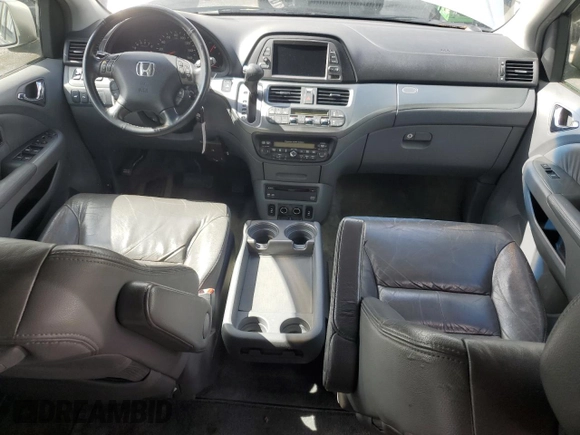 2005 Honda Odyssey Touring z VIN 5FNRL38835B071258, wystawiony jako Copart lot #57878295 z przebiegiem 143 474 mil mil oraz Szkoda całkowita • Salvage title. Historia ofert i sprzedaży dostępna na DreamBid. Obrazek 8.