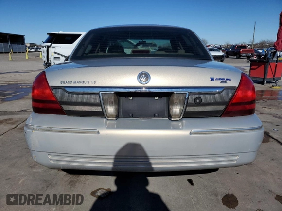 2009 Mercury Grand Marquis LS with VIN 2MEHM75V09X619313, listed as a Copart auction lot 41596455 with 198,017 mi miles and Salvage Title. Bid and sale history available at DreamBid. Image 6.