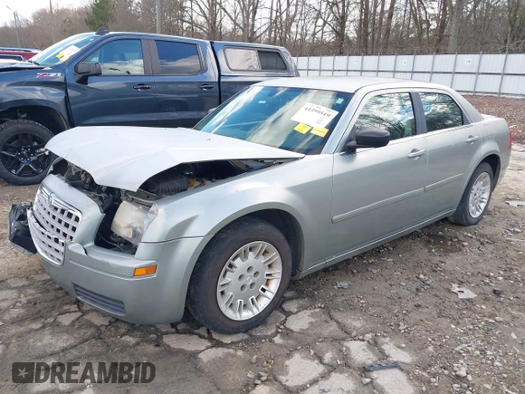2005 Chrysler 300 with VIN 2C3JA43R05H137403, listed as a IAAI auction lot 41399519 with 135,044 mi miles. Bid and sale history available at carsss.com. Image 2.