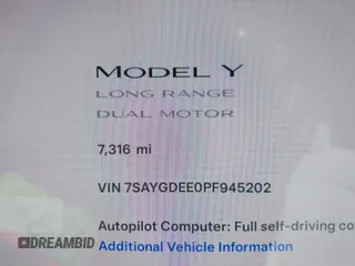 2023 Tesla Model Y Long Range with VIN 7SAYGDEE0PF945202, listed as a IAAI auction lot 41611762 with 7,316 mi miles and . Bid and sale history available at DreamBid. Image 15.