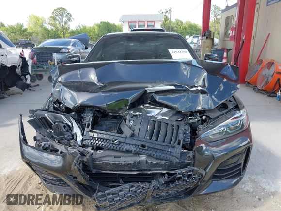 2021 BMW 4 Series M440i xDrive with VIN WBA13AR00MCF61520, listed as a IAAI auction lot 41944350 with 39,631 mi miles and . Bid and sale history available at DreamBid. Image 6.