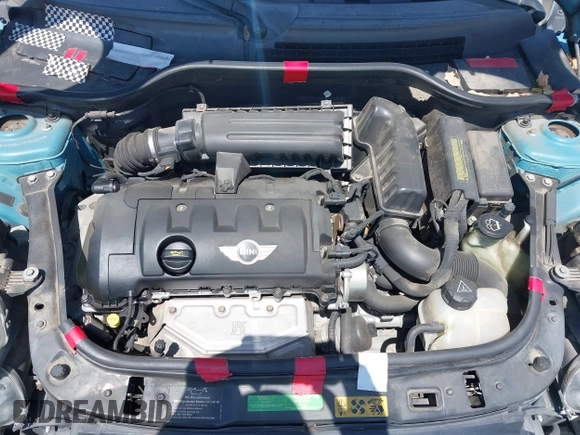 2007 MINI Hardtop with VIN WMWMF335X7TT54929, listed as a IAAI auction lot 42173757 with 71,496 mi miles and . Bid and sale history available at DreamBid. Image 10.