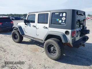 2007 Jeep Wrangler Unlimited X with VIN 1J4GB39147L199367, listed as a IAAI auction lot 40897772 with 229,309 mi miles and . Bid and sale history available at DreamBid. Image 3.