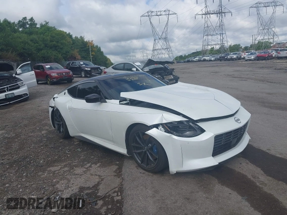 2023 Nissan Z Proto Spec with VIN JN1BZ4BH4PM311977, listed as a IAAI auction lot 42352895 with 1,020 mi miles and . Bid and sale history available at DreamBid. Image 1.