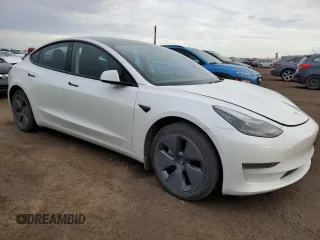 2023 Tesla Model 3 with VIN 5YJ3E1EA5PF484801, listed as a Copart auction lot 79766274 with 83,541 mi miles and Clean Title. Bid and sale history available at DreamBid. Image 4.