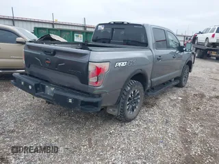 2021 Nissan Titan Pro-4X with VIN 1N6AA1ED3MN531332, listed as a IAAI auction lot 41918065 with 125,323 mi miles and . Bid and sale history available at DreamBid. Image 4.