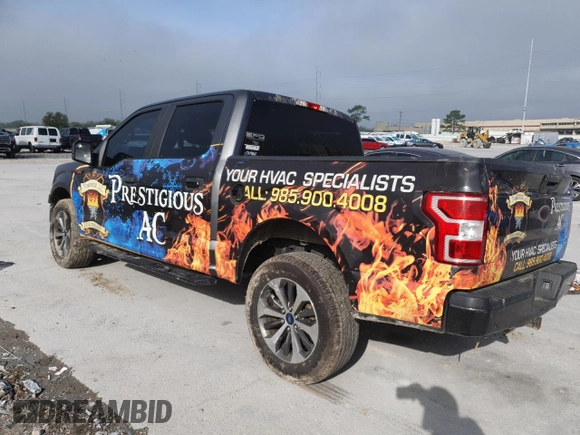 2019 Ford F-150 XL with VIN 1FTEW1CP3KKD68005, listed as a Copart auction lot 50599475 with 129,200 mi miles and Salvage Title. Bid and sale history available at carsss.com. Image 2.