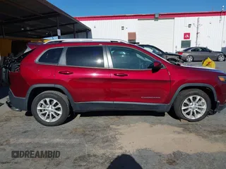 2020 Jeep Cherokee Latitude with VIN 1C4PJLCB4LD648903, listed as a IAAI auction lot 42267209 with 20,133 mi miles and . Bid and sale history available at DreamBid. Image 13.