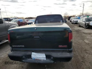 2001 GMC Sonoma SLS 1SG z VIN 1GTCS19W318247147, wystawiony jako Copart lot #83135464 z przebiegiem 292 056 mil mil oraz Szkody całkowita. Historia ofert i sprzedaży dostępna na DreamBid. Obrazek 10.