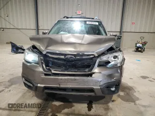 2018 Subaru Forester Touring z VIN JF2SJAWC4JH522454, wystawiony jako Copart lot #58204655 z przebiegiem 117 611 mil mil oraz Szkoda całkowita • Salvage title. Historia ofert i sprzedaży dostępna na DreamBid. Obrazek 5.