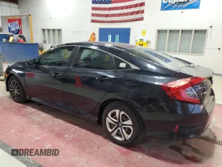 2016 Honda Civic Sedan LX with VIN 19XFC2F50GE212785, listed as a Copart auction lot 52723995 with 146,097 mi miles and Salvage Title. Bid and sale history available at carsss.com. Image 2.