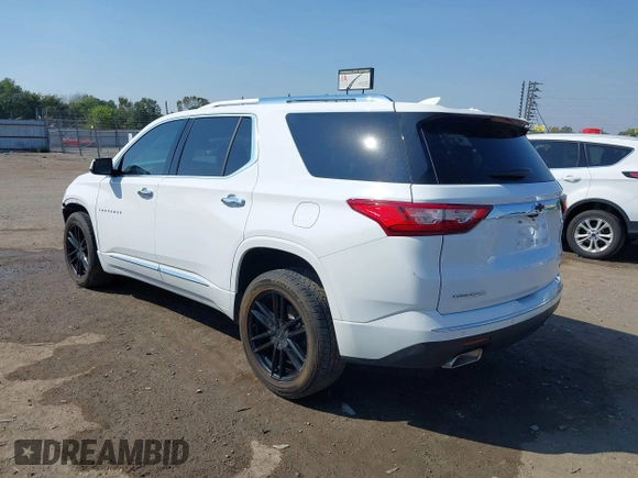 2018 Chevrolet Traverse Premier z VIN 1GNERKKW6JJ220965, wystawiony jako IAAI lot #37625637 z przebiegiem 99 072 mil mil oraz . Historia ofert i sprzedaży dostępna na DreamBid. Obrazek 3.