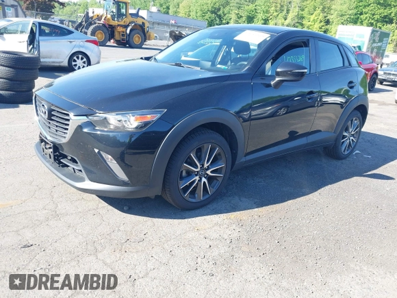2018 Mazda CX-3 Touring z VIN JM1DKFC73J0321605, wystawiony jako IAAI lot #42355269 z przebiegiem 40 053 mil mil oraz . Historia ofert i sprzedaży dostępna na DreamBid. Obrazek 17.