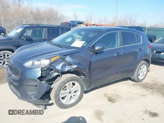 2018 Kia Sportage LX with VIN KNDPM3AC1J7453713, listed as a IAAI auction lot 41677259 with 165,792 mi miles and . Bid and sale history available at carsss.com. Image 2.