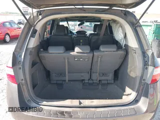 2013 Honda Odyssey Touring with VIN 5FNRL5H98DB080296, listed as a IAAI auction lot 42461843 with 104,901 mi miles and . Bid and sale history available at DreamBid. Image 16.