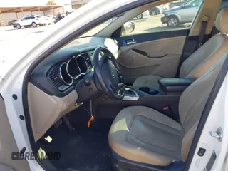 2011 Kia Optima EX with VIN KNAGN4A60B5163017, listed as a IAAI auction lot 41277968 with 185,012 mi miles and . Bid and sale history available at carsss.com. Image 5.